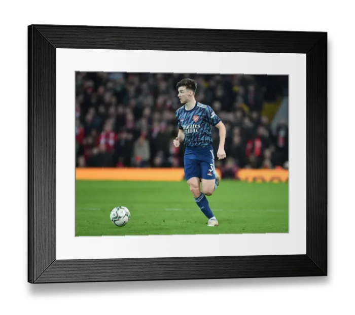 Framed Print : Arsenal's Kieran Tierney Faces Off Against Liverpool in Carabao Cup Semi-Final Clash Framed Print : Arsenal's Kieran Tierney Faces Off Against Liverpool in Carabao Cup Semi-Final Clash