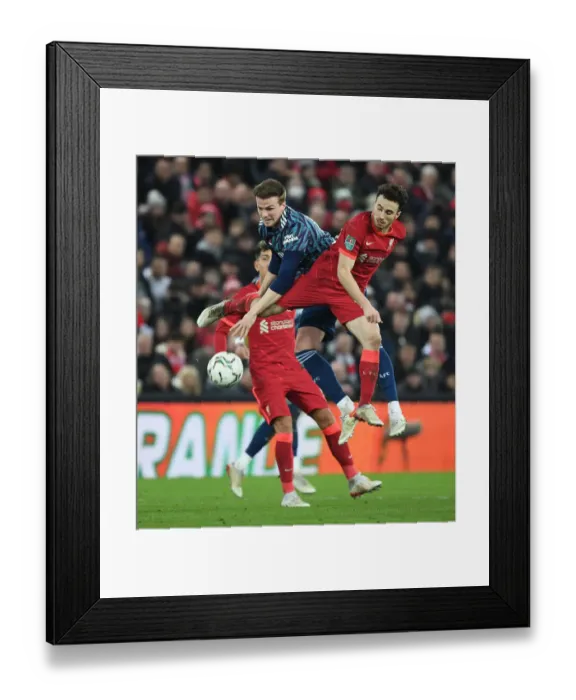 Framed Print : Arsenal's Rob Holding Faces Off Against Liverpool's Diogo Jota in Carabao Cup Semi-Final Clash Framed Print : Arsenal's Rob Holding Faces Off Against Liverpool's Diogo Jota in Carabao Cup Semi-Final Clash