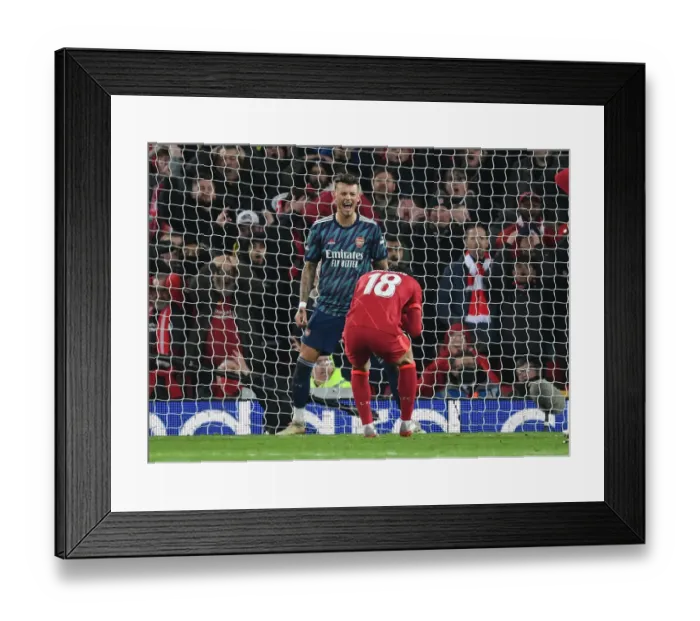 Framed Print : Ben White Reacts as Minamino Shoots Over: Liverpool vs Arsenal in Carabao Cup Semi-Final Framed Print : Ben White Reacts as Minamino Shoots Over: Liverpool vs Arsenal in Carabao Cup Semi-Final