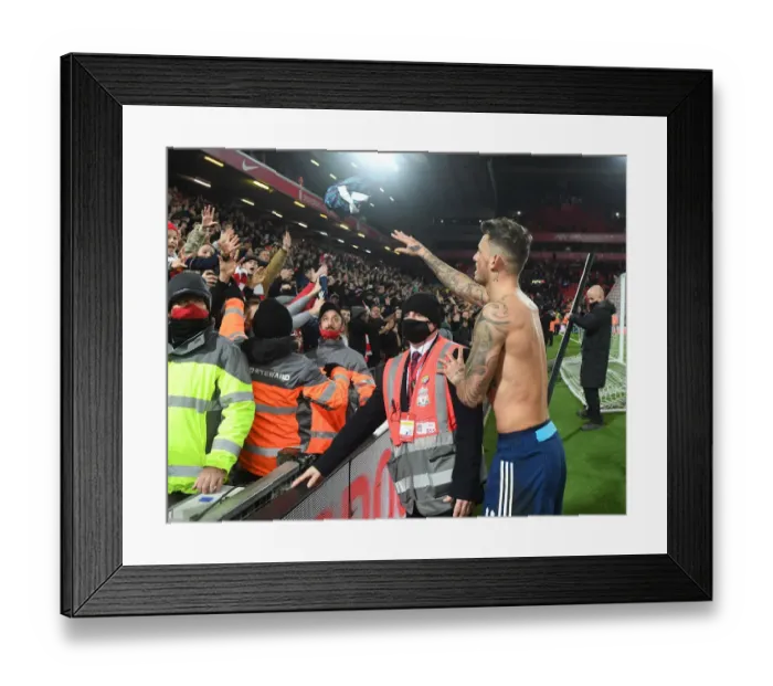 Framed Print : Ben White's Shirt Throw: Liverpool vs Arsenal in Carabao Cup Semi-Final First Leg