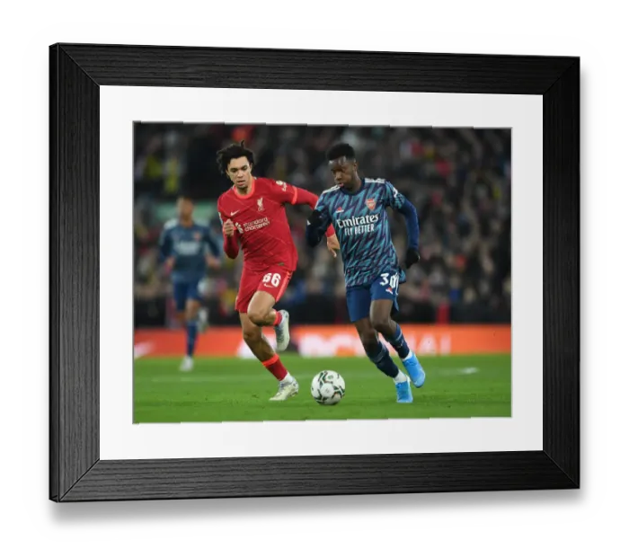 Framed Print : Arsenal's Eddie Nketiah Faces Off Against Liverpool's Trent Alexander-Arnold in Carabao Cup Semi-Final Clash Framed Print : Arsenal's Eddie Nketiah Faces Off Against Liverpool's Trent Alexander-Arnold in Carabao Cup Semi-Final Clash