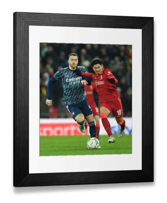 Framed Print : Chambers vs Minamino: Intense Battle in Carabao Cup Semi-Final First Leg between Liverpool and Arsenal Framed Print : Chambers vs Minamino: Intense Battle in Carabao Cup Semi-Final First Leg between Liverpool and Arsenal