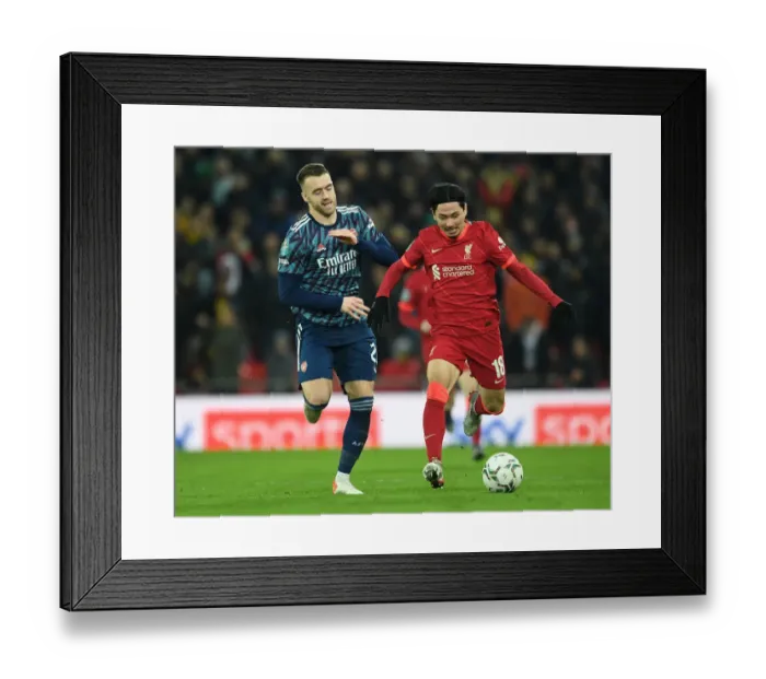 Framed Print : Intense Rivalry: Chambers vs Minamino - Carabao Cup Semi-Final Showdown between Liverpool and Arsenal