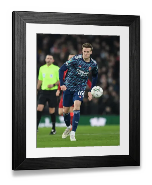 Framed Print : Arsenal's Rob Holding: Unyielding Defender in Carabao Cup Semi-Final Battle Against Liverpool Framed Print : Arsenal's Rob Holding: Unyielding Defender in Carabao Cup Semi-Final Battle Against Liverpool
