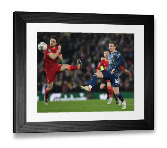 Framed Print : Arsenal's Rob Holding Fends Off Liverpool's Diogo Jota in Carabao Cup Semi-Final Clash