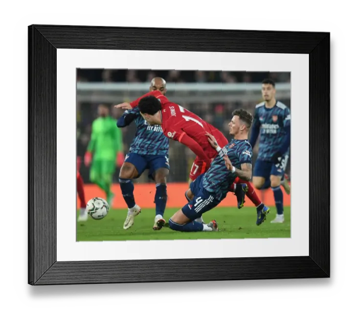 Framed Print : Arsenal's Ben White Tackles Curtis Jones in Carabao Cup Semi-Final Clash Against Liverpool