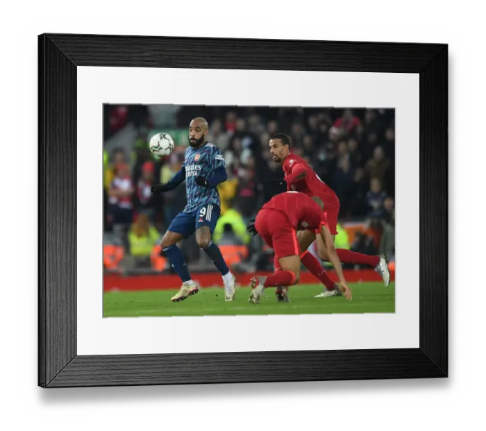 Framed Print : Alexandre Lacazette Faces Off Against Joel Matip in Intense Carabao Cup Clash: Liverpool vs Arsenal, 2021-22 Framed Print : Alexandre Lacazette Faces Off Against Joel Matip in Intense Carabao Cup Clash: Liverpool vs Arsenal, 2021-22