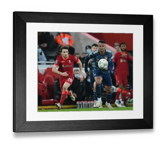 Framed Print : Gabriel Magalhaes vs Diogo Jota: Intense Battle in Liverpool v Arsenal Carabao Cup Semi-Final