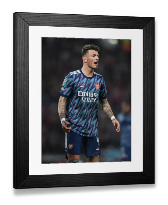 Framed Print : Arsenal's Ben White Stares Down Liverpool in Carabao Cup Semi-Final Clash Framed Print : Arsenal's Ben White Stares Down Liverpool in Carabao Cup Semi-Final Clash