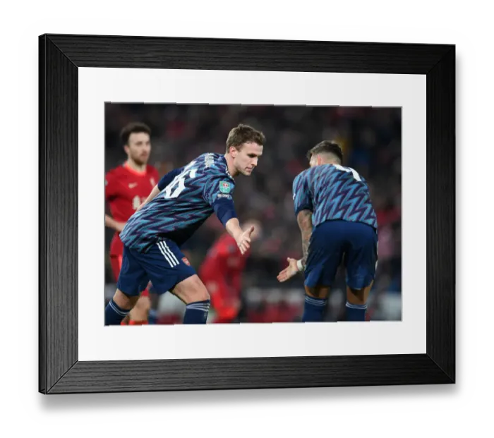 Framed Print : Arsenal's Holding and White Brace Anfield Fortress in Carabao Cup Semi-Final