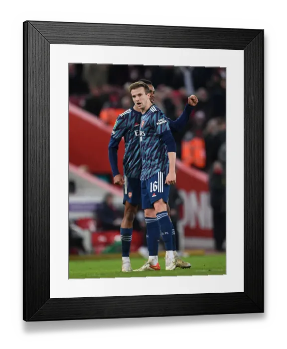 Framed Print : Gabriel Magalhaes and Rob Holding of Arsenal Reunite After Carabao Cup Semi-Final Clash Against Liverpool