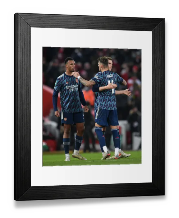 Framed Print : Arsenal's Magalhaes, White, and Holding: United in Victory After Intense Carabao Cup Semi-Final Against Liverpool Framed Print : Arsenal's Magalhaes, White, and Holding: United in Victory After Intense Carabao Cup Semi-Final Against Liverpool