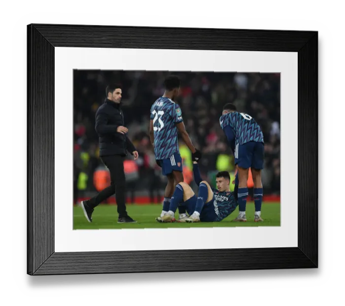 Framed Print : Arsenal's Martinelli Receives Attention from Mikel Arteta after Injury in Carabao Cup Semi-Final vs. Liverpool
