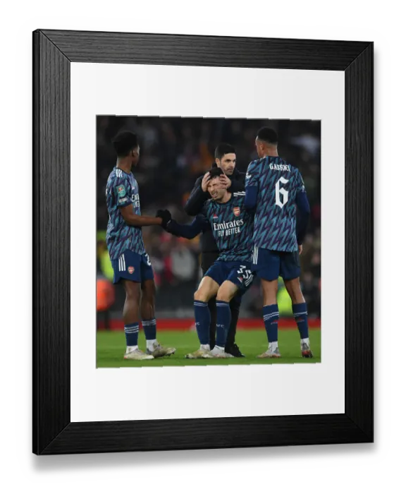 Framed Print : Arsenal's Gabriel Martinelli Receives Attention from Mikel Arteta after Injury in Carabao Cup Semi-Final vs Liverpool Framed Print : Arsenal's Gabriel Martinelli Receives Attention from Mikel Arteta after Injury in Carabao Cup Semi-Final vs Liverpool