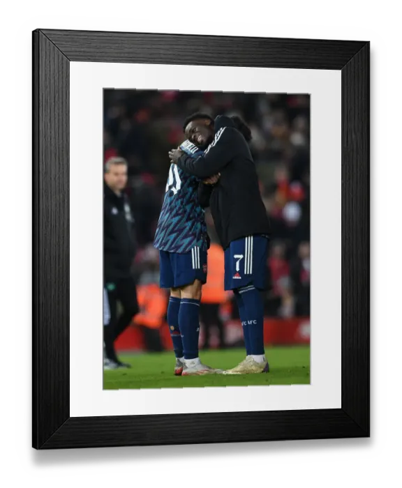 Framed Print : Arsenal's Bukayo Saka and Gabriel Martinelli Embrace in Carabao Cup Semi-Final Clash vs Liverpool Framed Print : Arsenal's Bukayo Saka and Gabriel Martinelli Embrace in Carabao Cup Semi-Final Clash vs Liverpool