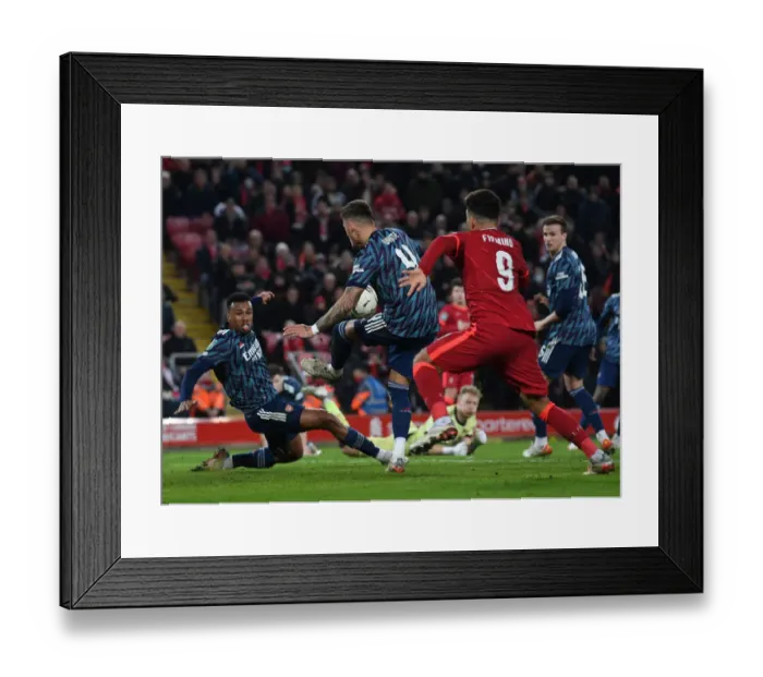 Framed Print : Arsenal's Ben White Bravely Blocks Roberto Firmino's Shot in Carabao Cup Semi-Final Clash vs Liverpool Framed Print : Arsenal's Ben White Bravely Blocks Roberto Firmino's Shot in Carabao Cup Semi-Final Clash vs Liverpool