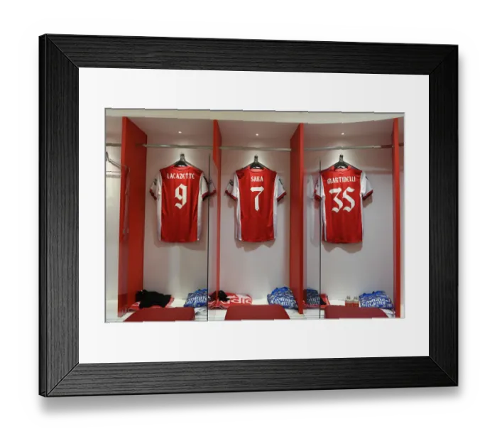 Framed Print : Arsenal's Pre-Match Focus: Lacazette, Saka, and Martinelli's Shirts in the Changing Room before Carabao Cup Semi-Final vs Liverpool Framed Print : Arsenal's Pre-Match Focus: Lacazette, Saka, and Martinelli's Shirts in the Changing Room before Carabao Cup Semi-Final vs Liverpool