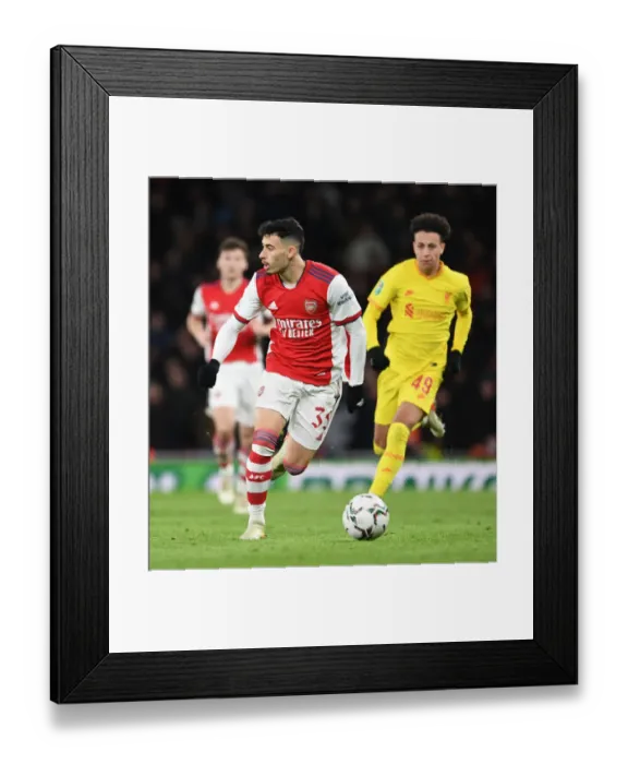 Framed Print : Martinelli vs. Liverpool: Arsenal's Star Forward Battles in Carabao Cup Semi-Final Showdown