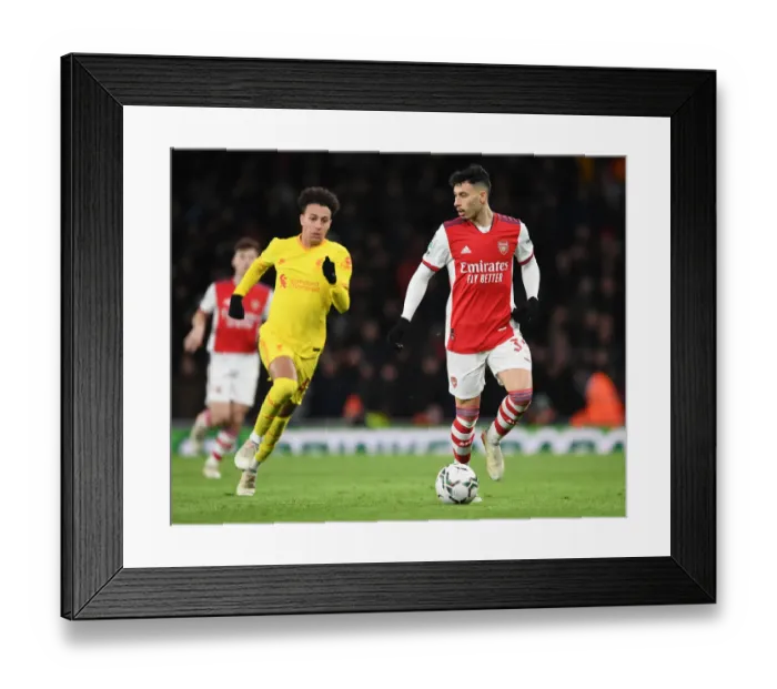 Framed Print : Martinelli vs Liverpool: Arsenal's Star Forward Battles in Carabao Cup Semi-Final Showdown