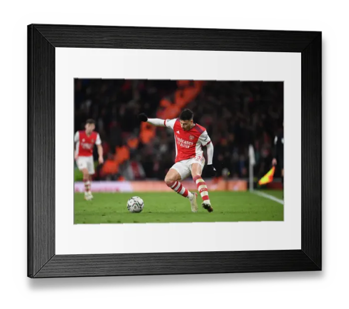 Framed Print : Martinelli Takes on Liverpool in Carabao Cup Semi-Final Clash