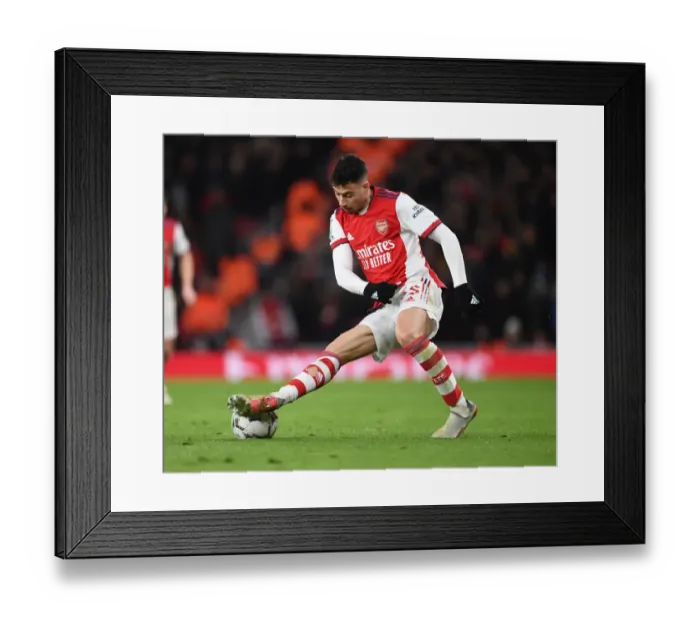 Framed Print : Martinelli vs. Liverpool: Arsenal's Star Forward in Carabao Cup Semi-Final Showdown