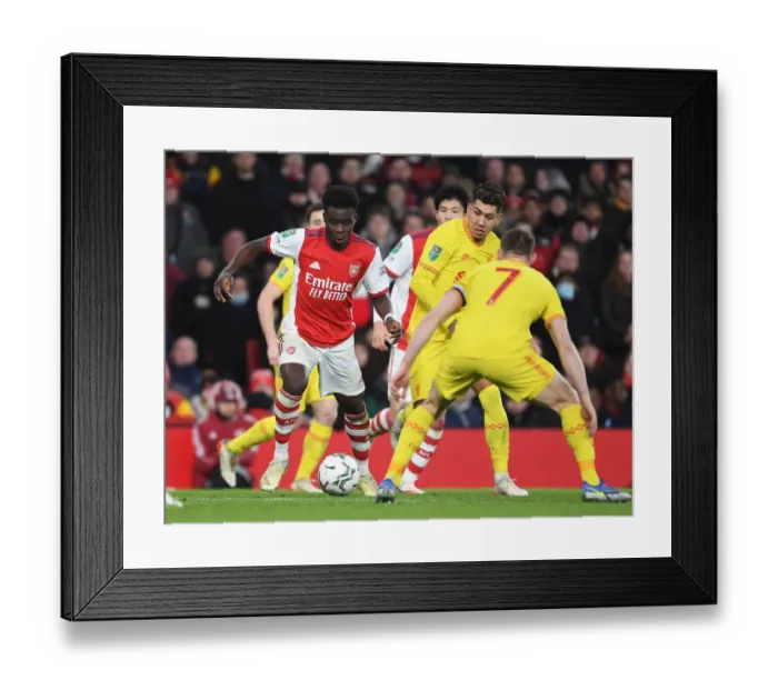 Framed Print : Arsenal vs Liverpool: Bukayo Saka Clashes with James Milner in Carabao Cup Semi-Final Showdown Framed Print : Arsenal vs Liverpool: Bukayo Saka Clashes with James Milner in Carabao Cup Semi-Final Showdown