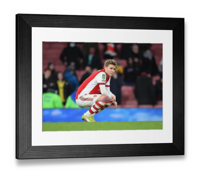 Framed Print : Martin Odegaard Disappointed: Arsenal's Reaction to Carabao Cup Semi-Final Defeat by Liverpool