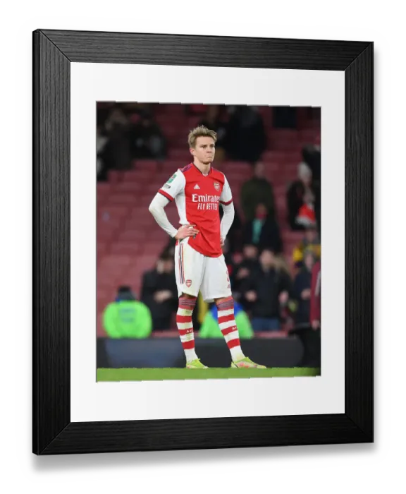Framed Print : Martin Odegaard's Disappointed Reaction: Arsenal Eliminated from Carabao Cup by Liverpool