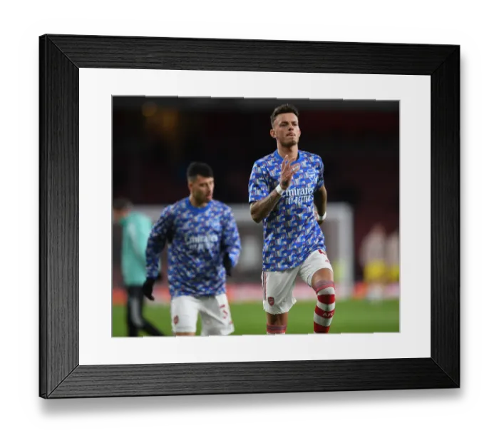 Framed Print : Arsenal's Ben White Focuses Ahead of Arsenal vs. Liverpool Carabao Cup Showdown