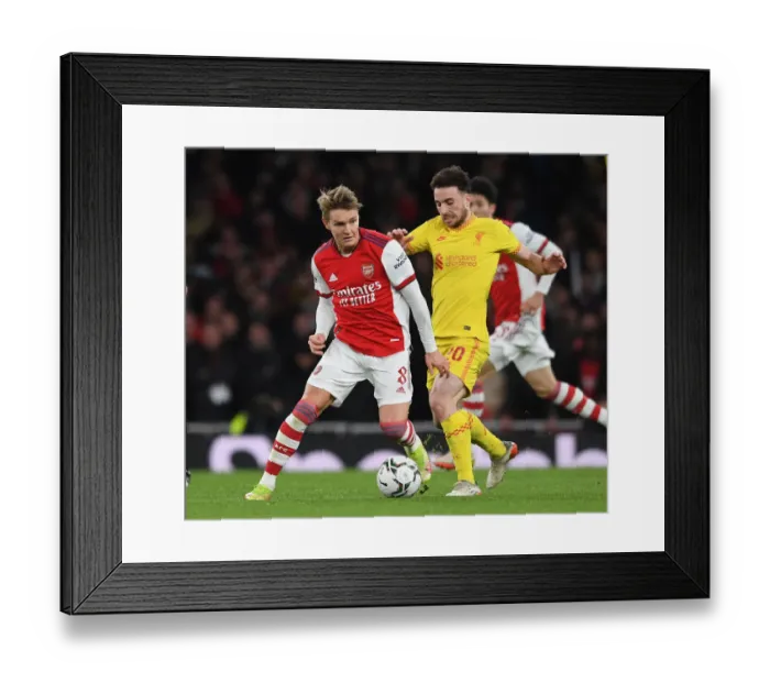 Framed Print : Arsenal vs Liverpool Showdown: Odegaard vs Jota Battle in Carabao Cup Semi-Finals Framed Print : Arsenal vs Liverpool Showdown: Odegaard vs Jota Battle in Carabao Cup Semi-Finals