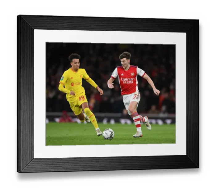 Framed Print : Arsenal vs Liverpool: Kieran Tierney Clashes with Kaide Gordon in Carabao Cup Semi-Final Showdown