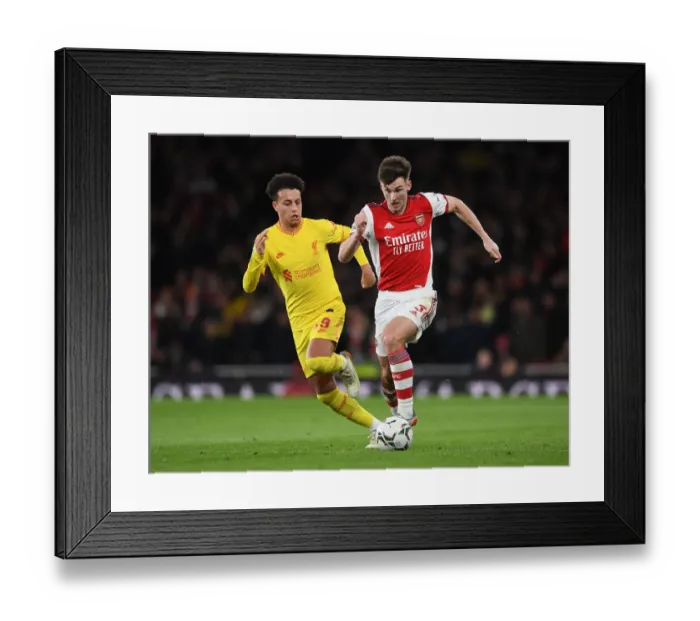 Framed Print : Arsenal vs Liverpool Showdown: A Battle of Wings - Tierney vs Gordon in Carabao Cup Semi-Final