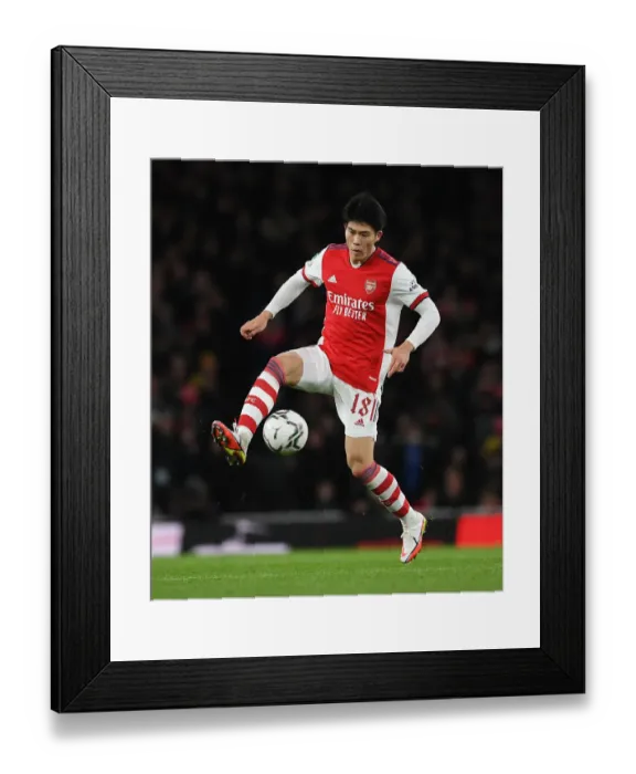 Framed Print : Arsenal's Tomiyasu Prepares for Carabao Cup Showdown Against Liverpool