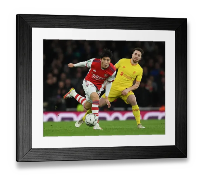Framed Print : Tomiyasu vs. Jota: Battle in the Carabao Cup Semi-Finals - Arsenal vs. Liverpool Showdown