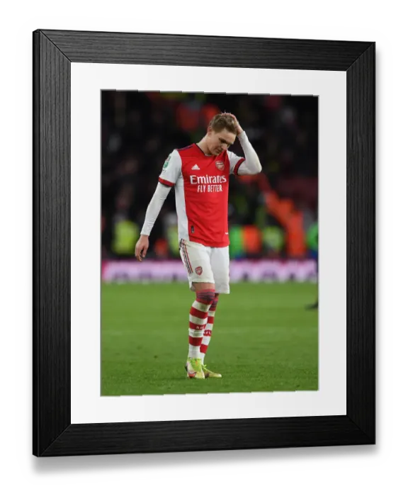 Framed Print : Martin Odegaard's Reaction: Arsenal vs Liverpool Carabao Cup Showdown