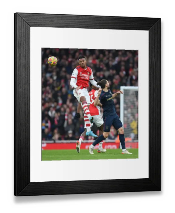 Framed Print : Gabriel Soars Over Rodriguez: Intense Aerial Battle in Arsenal vs. Burnley Premier League Clash Framed Print : Gabriel Soars Over Rodriguez: Intense Aerial Battle in Arsenal vs. Burnley Premier League Clash