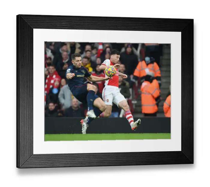 Framed Print : Arsenal vs Burnley: Tierney vs Tarkowski - Intense Battle at Emirates Stadium Framed Print : Arsenal vs Burnley: Tierney vs Tarkowski - Intense Battle at Emirates Stadium