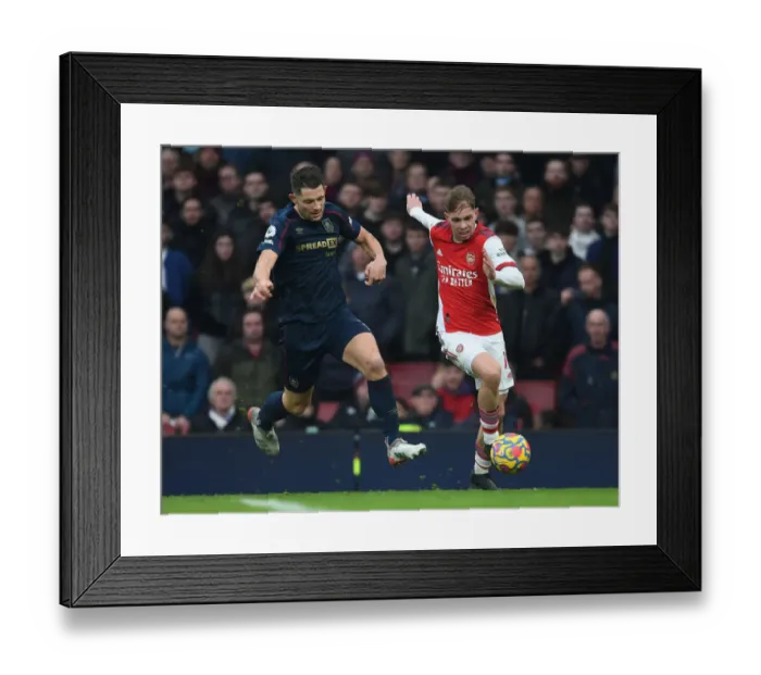 Framed Print : Emile Smith Rowe vs. James Tarkowski: Intense Face-Off in Arsenal's Battle Against Burnley Framed Print : Emile Smith Rowe vs. James Tarkowski: Intense Face-Off in Arsenal's Battle Against Burnley