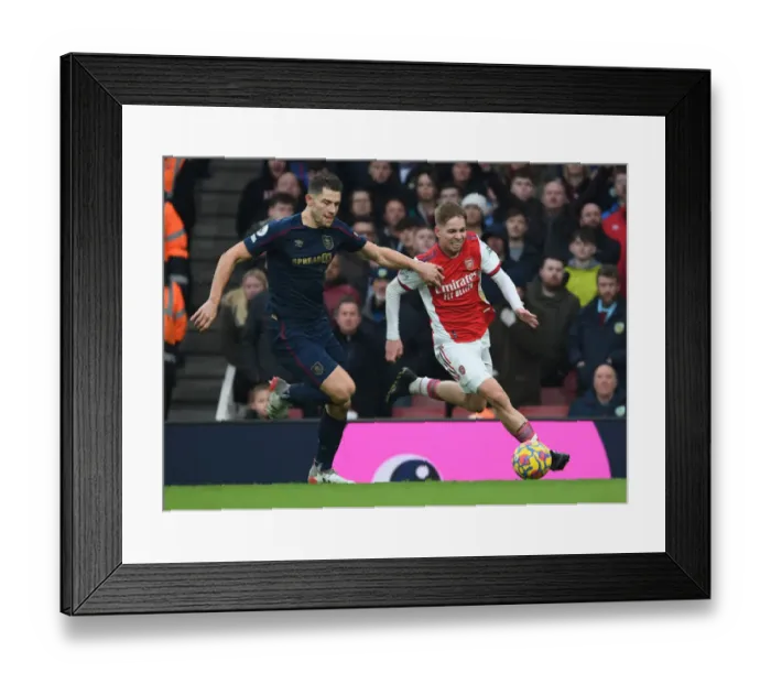 Framed Print : Arsenal's Emile Smith Rowe Clashes with Burnley's James Tarkowski in Premier League Showdown Framed Print : Arsenal's Emile Smith Rowe Clashes with Burnley's James Tarkowski in Premier League Showdown