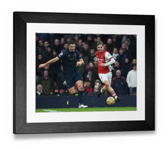 Framed Print : Emile Smith Rowe vs. James Tarkowski: A Tenacious Tussle in Arsenal's Battle Against Burnley