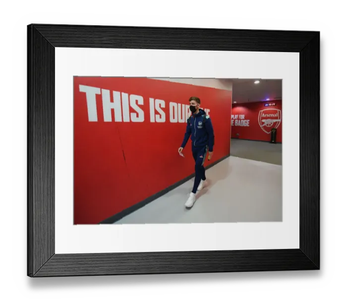 Framed Print : Arsenal's Kieran Tierney Gears Up for Arsenal v Burnley Clash (2021-22)