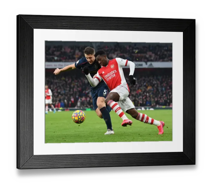 Framed Print : Arsenal's Eddie Nketiah Clashes with Burnley's James Tarkowski in Premier League Showdown