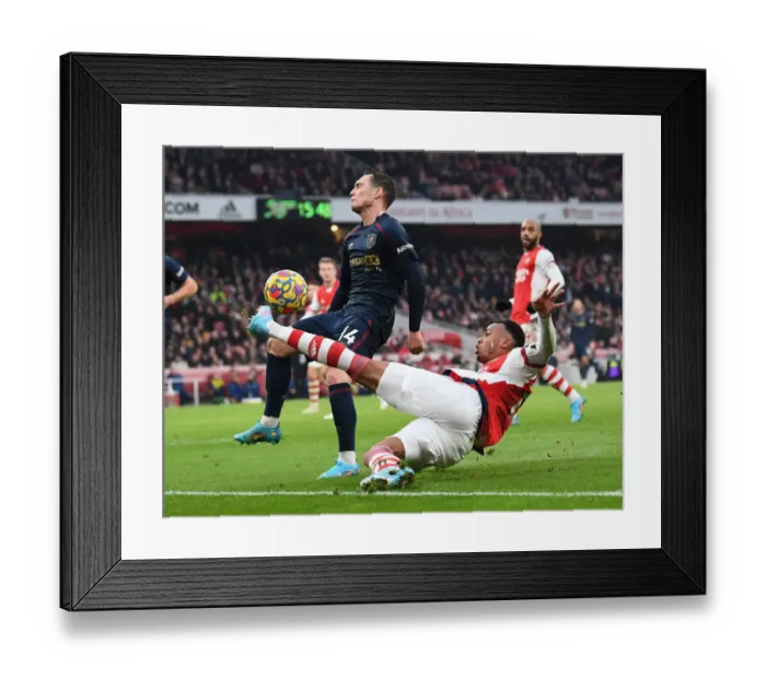Framed Print : Intense Face-Off: Magalhaes vs Roberts - Arsenal's Battle Against Burnley (2021-22)