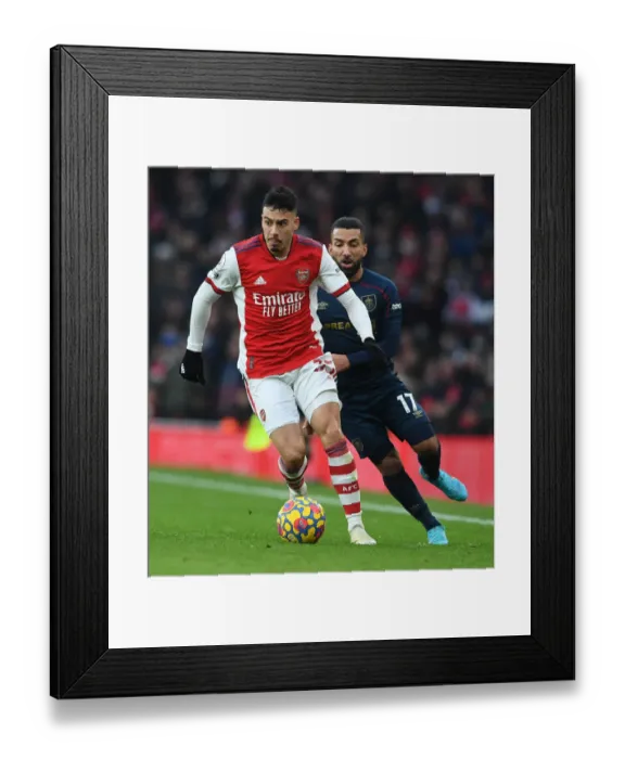 Framed Print : Arsenal's Martinelli Faces Off Against Burnley's Lennon in Premier League Clash Framed Print : Arsenal's Martinelli Faces Off Against Burnley's Lennon in Premier League Clash