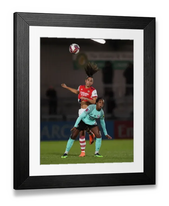 Framed Print : Arsenal Women vs Brighton Hove Albion Women: A Tight FA WSL Showdown - Rafaelle Souza Battles Danielle Carter for the Ball Framed Print : Arsenal Women vs Brighton Hove Albion Women: A Tight FA WSL Showdown - Rafaelle Souza Battles Danielle Carter for the Ball