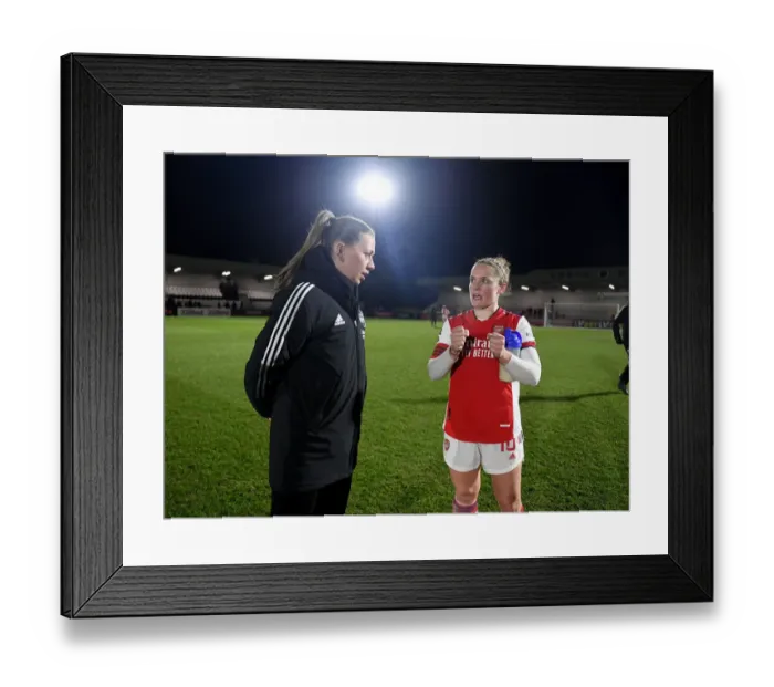 Framed Print : Determined Duo: McCabe and Little's Post-Match Moment at Arsenal Women vs Brighton Hove Albion (2021-22)