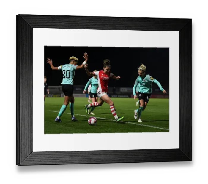 Framed Print : Intense Battle: Laura Wienroither of Arsenal vs Brighton's Defense at Meadow Park, FA WSL