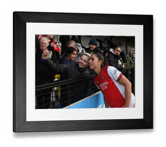 Framed Print : Arsenal's Rafaelle and Fan Celebrate Selfie Moment After Arsenal Women's Victory Over Manchester United (2021-22) Framed Print : Arsenal's Rafaelle and Fan Celebrate Selfie Moment After Arsenal Women's Victory Over Manchester United (2021-22)
