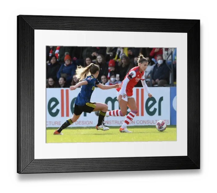 Framed Print : Arsenal vs Manchester United Women: A Football Rivalry Unfolds - Catley vs Toone Showdown