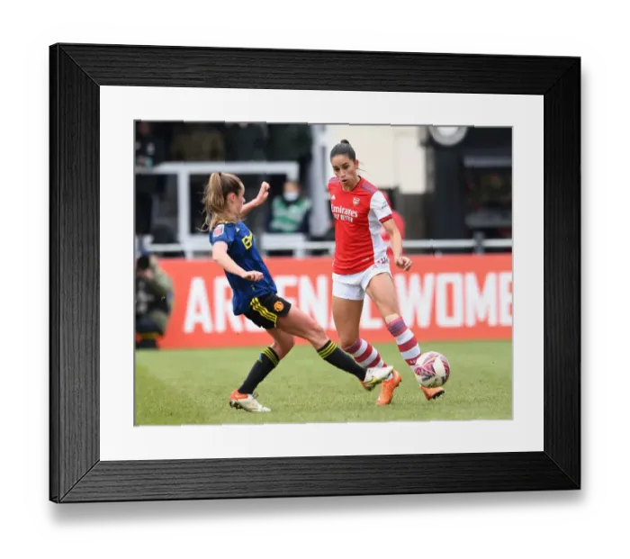 Framed Print : Arsenal vs Manchester United: A Tight FA WSL Showdown - Rafaelle Souza Escapes Pressure from Ella Toone